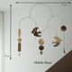 Mobile model Rana . Mobile in abstract brass.