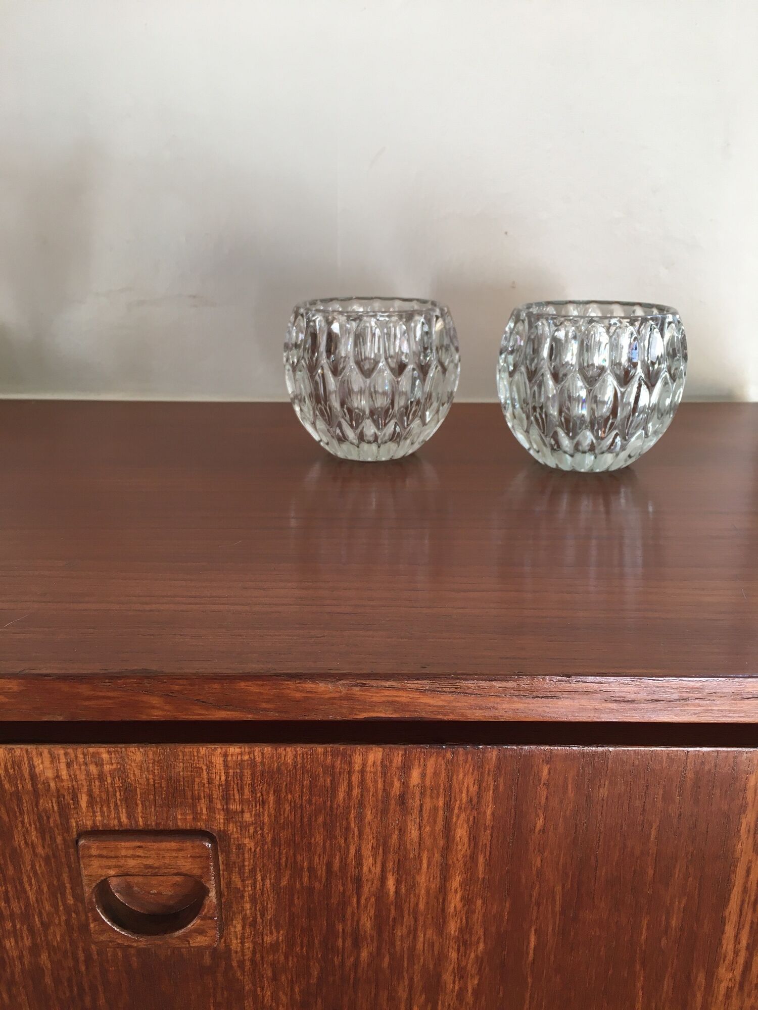 Duo of chiseled glass photophores