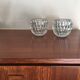 Duo of chiseled glass photophores