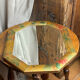 Miroir biseauté, de forme octogonale, en bois