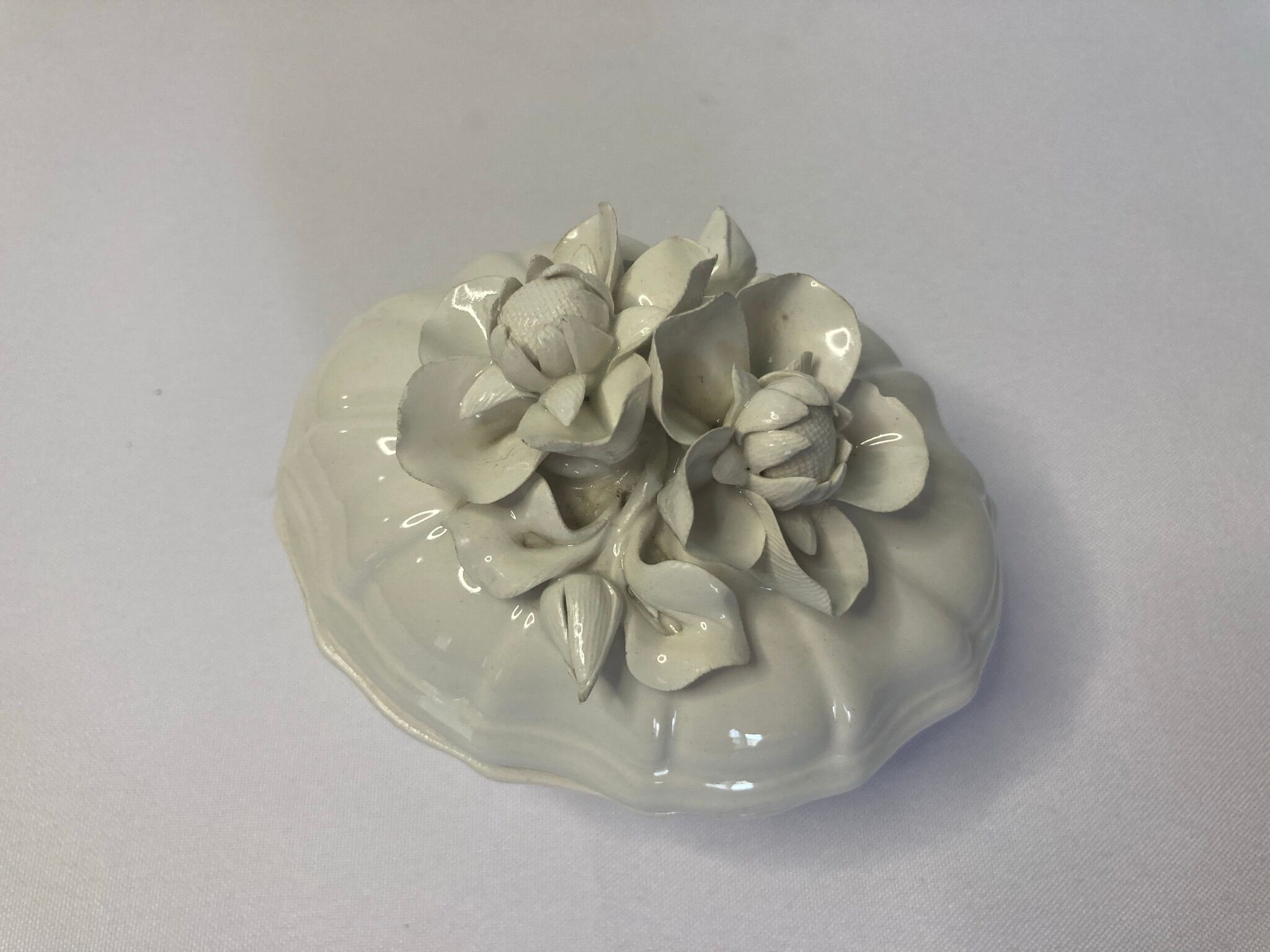Old candy maker in white art nouveau slurry