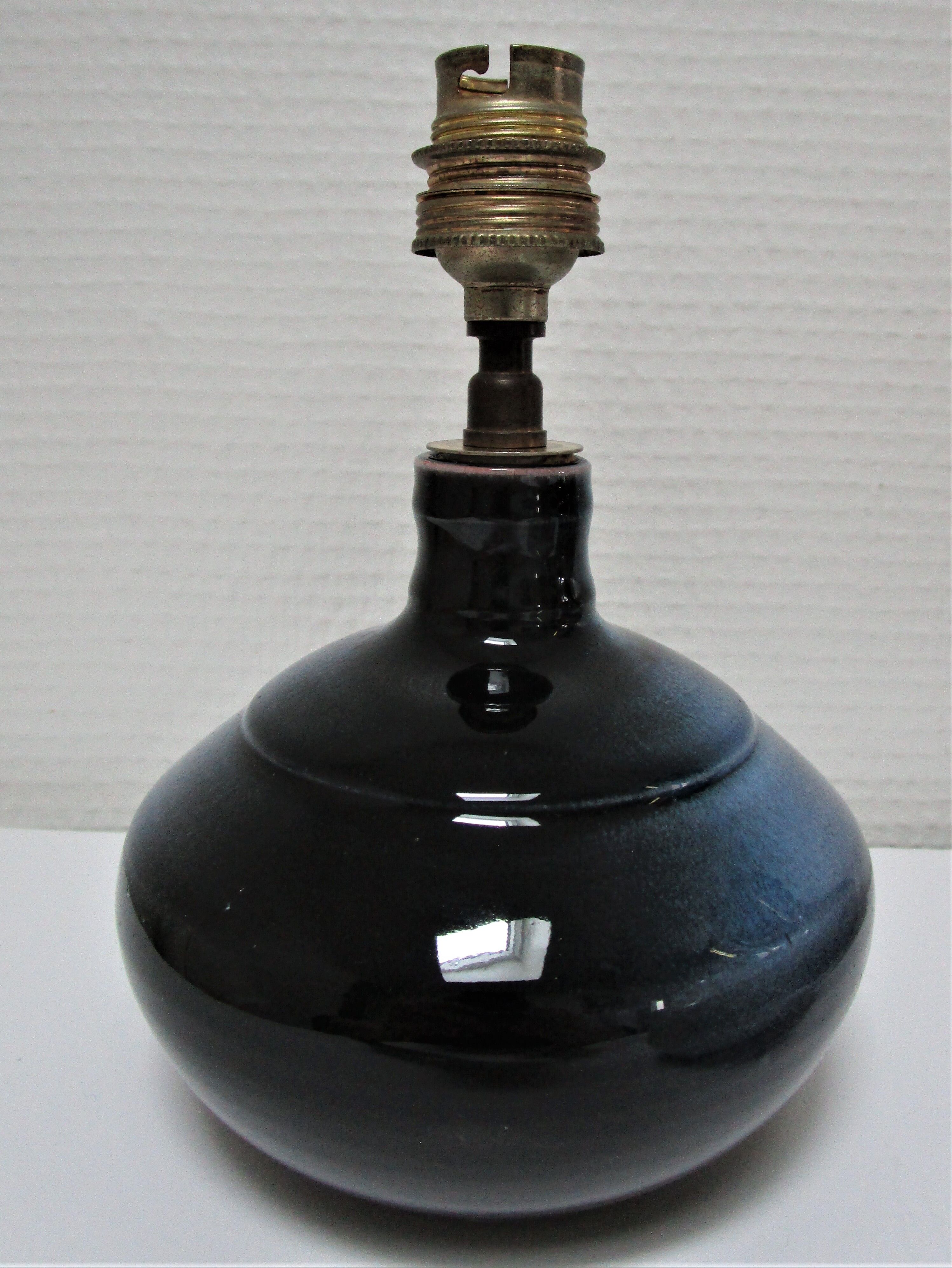 Three vintage ceramic lamps in blue, white and suede