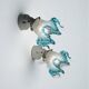 Pair of wall lights with porcelain feet and blue glass tulips in Art Deco style.
