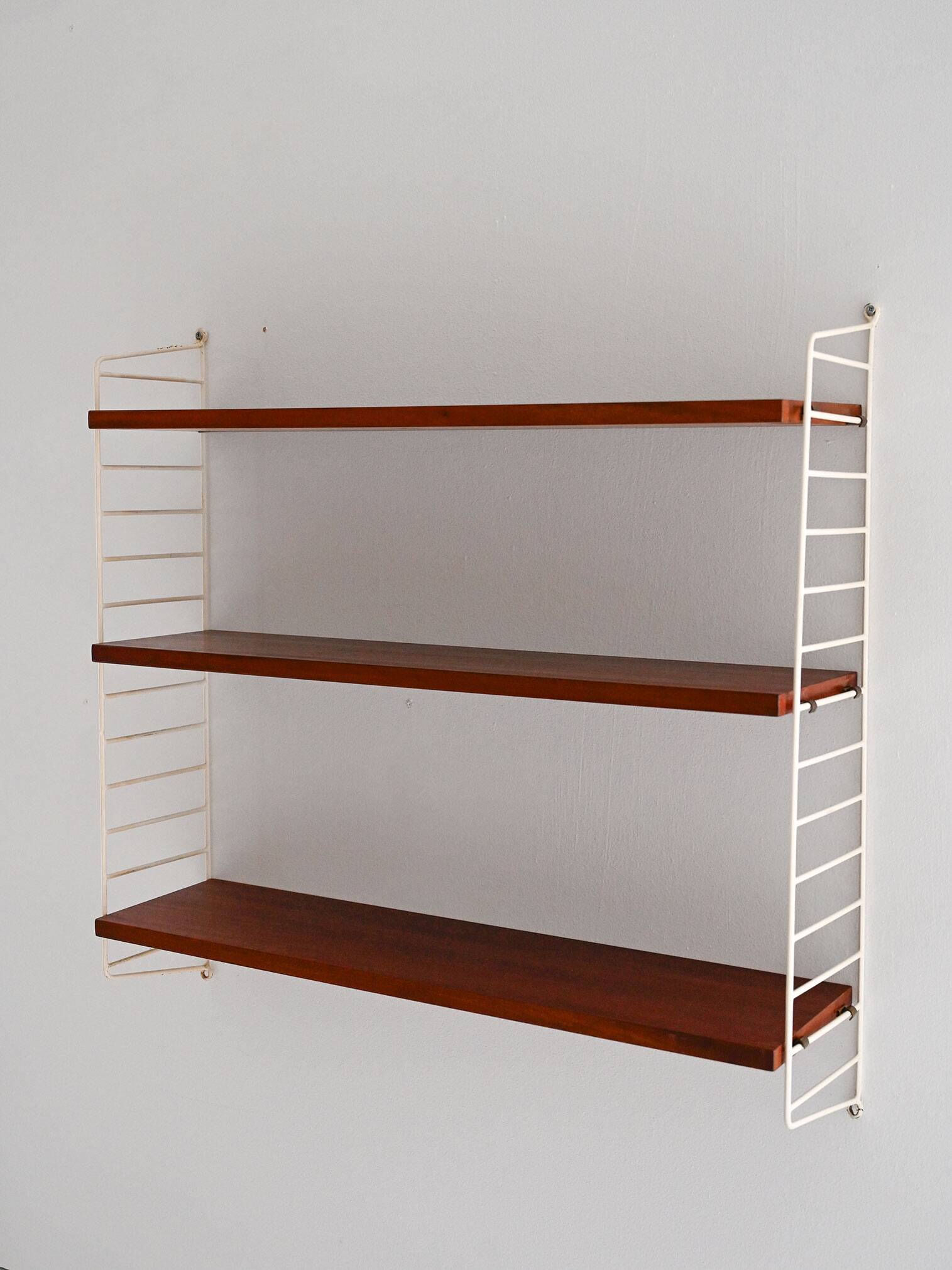 1960s Scandinavian Hylla wall shelf in mahogany