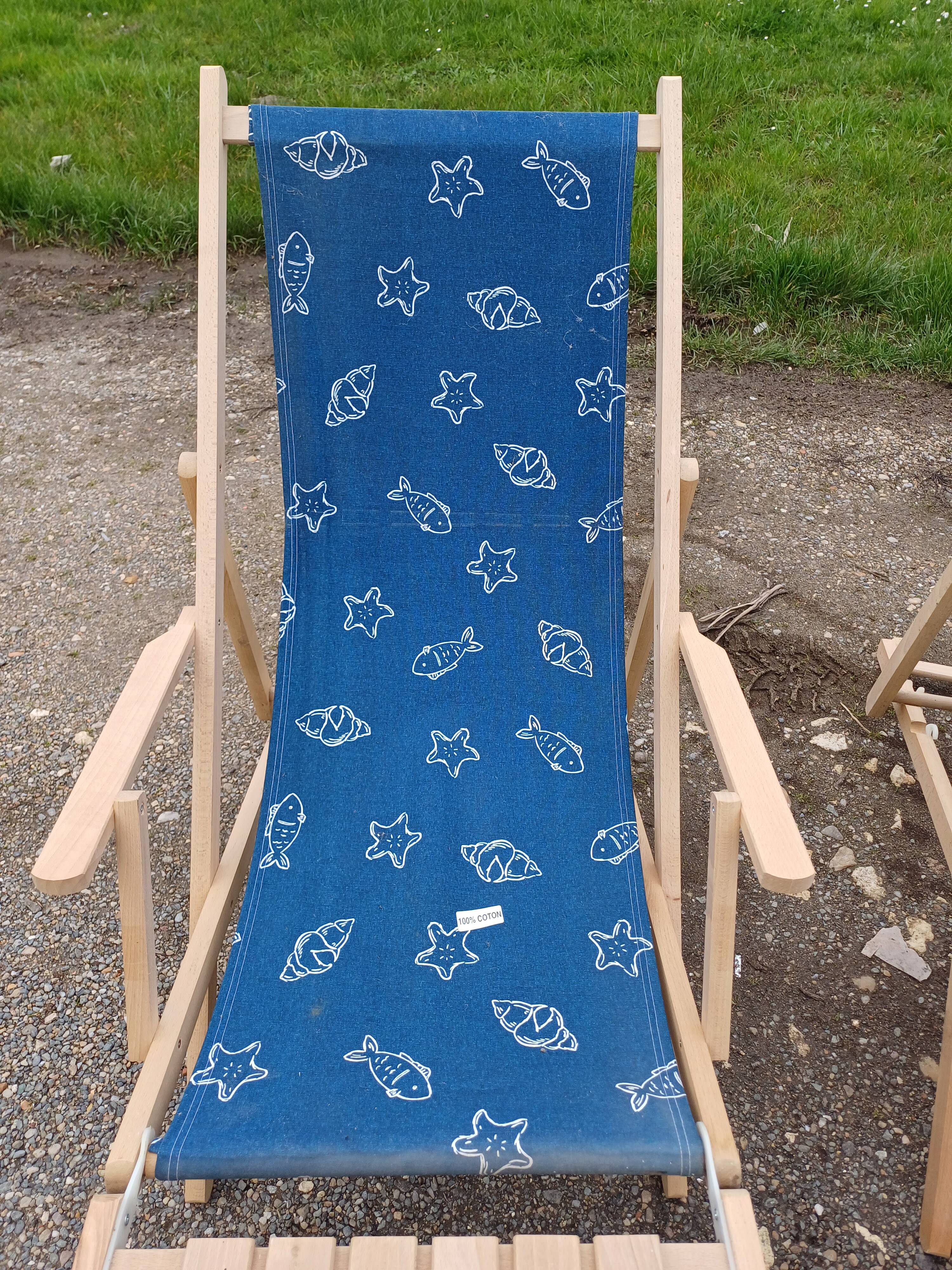 Pair of wood and fabric long chairs