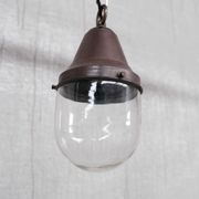 Pair of brass and clear glass industrial pendants