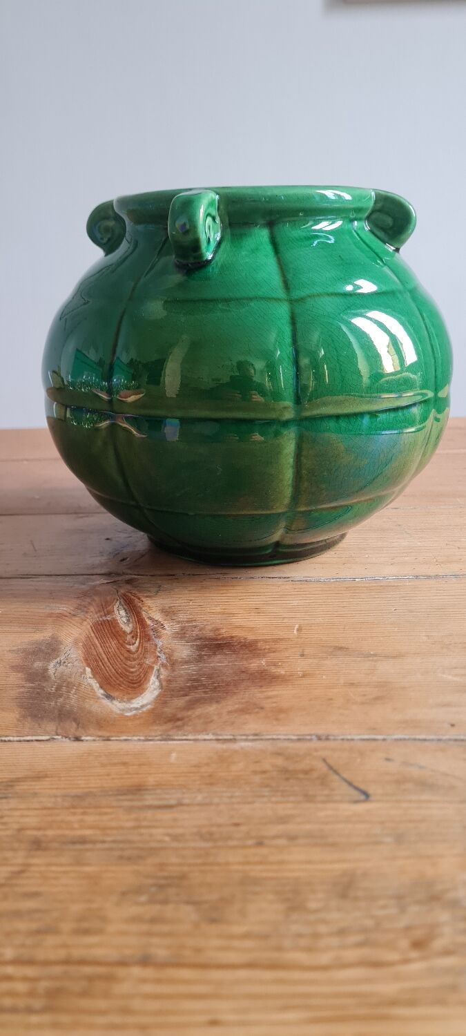 Green glazed earthenware vase