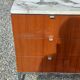 Florence Knoll buffet in wood and marble with chrome legs from the 1970s.