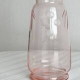 Antique translucent pink glass bottle