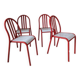 Set of 4 modernist red metal chairs
