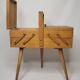 Wooden worker with spindle legs