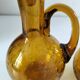 Duo of blown glass carafes – Biot signed – Bubbled amber glass