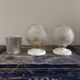 Set of two chiseled glass globe wall lights