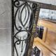 Miroir art deco 1930 en fer forge glace biseautee
