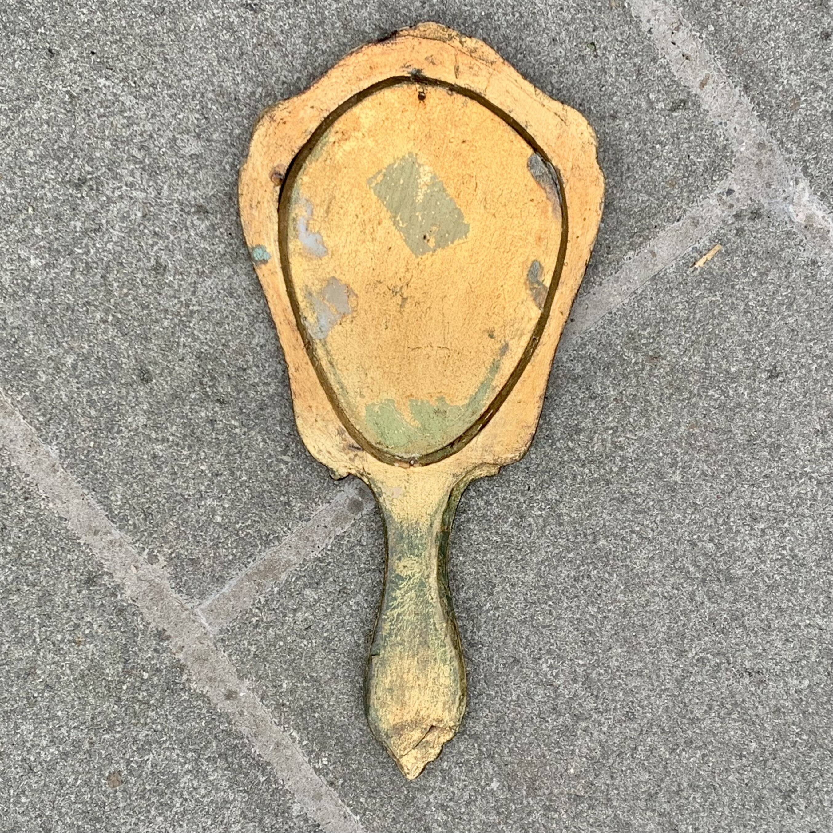 Old Florentine style carved wooden hand mirror