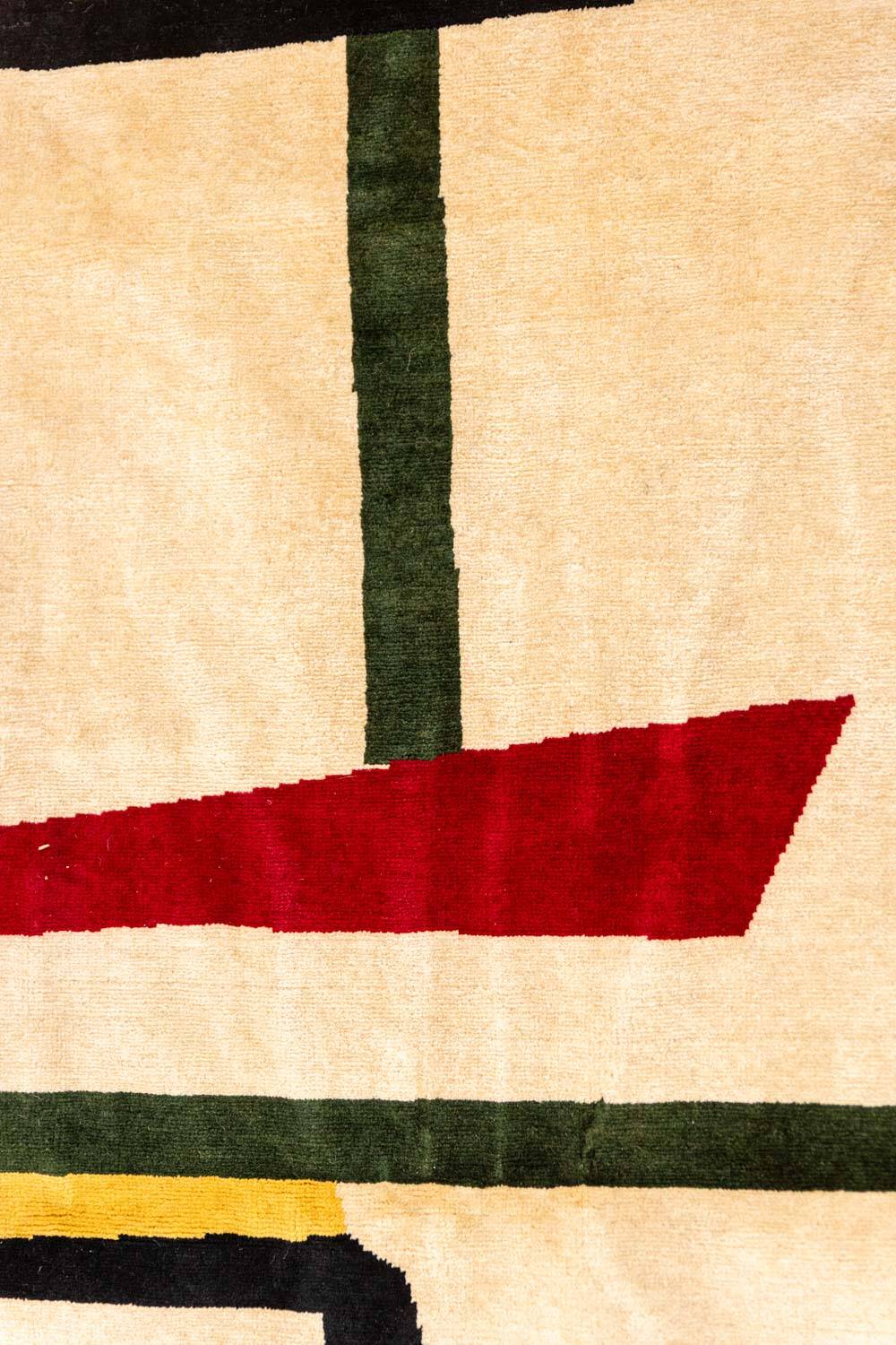 Handwoven wool tapestry with colourful geometric design. 2026.