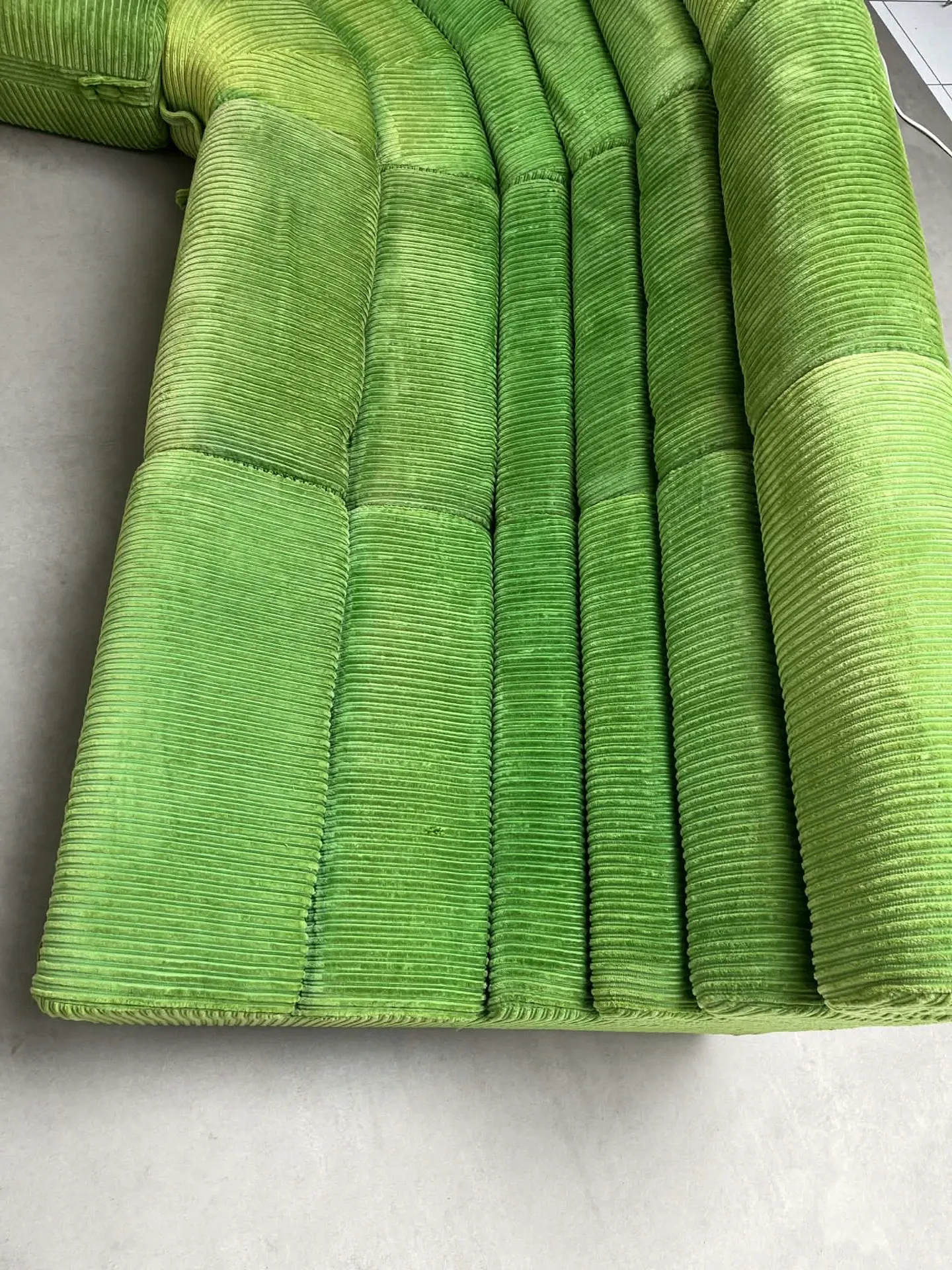 Modular green velvet corner sofa, 1970s