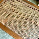 Canework and dark wood bench