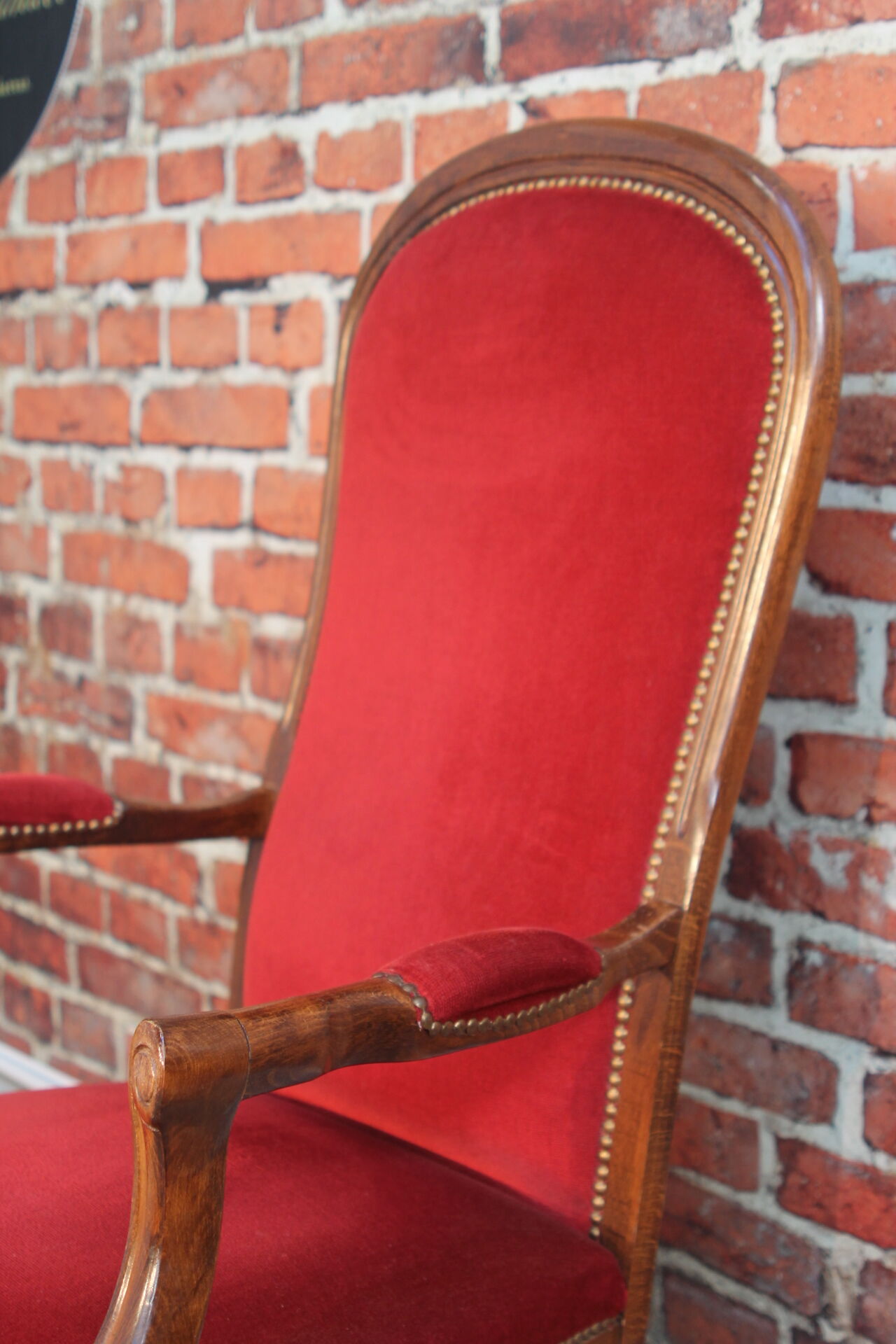Red velvet voltaire armchair