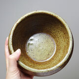 Vintage glazed stoneware bowl or planter in rustic wabi-sabi style.