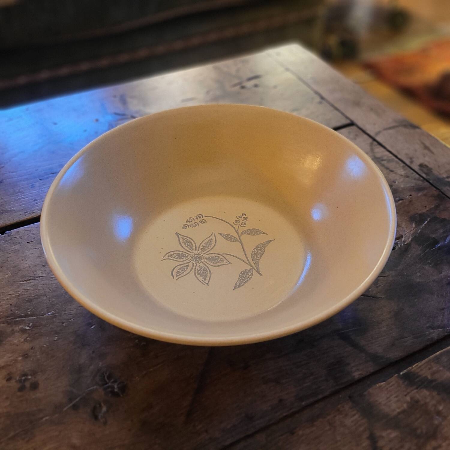 Stoneware salad bowl with floral decoration. 1970s