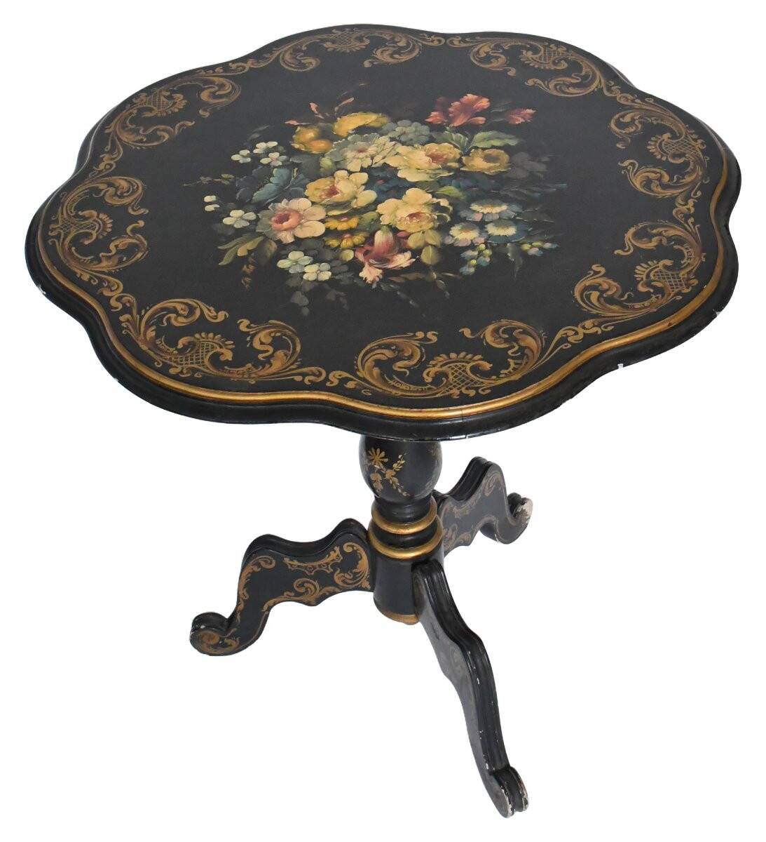 Blackened wooden side table decorated with a painted bouquet of flowers.