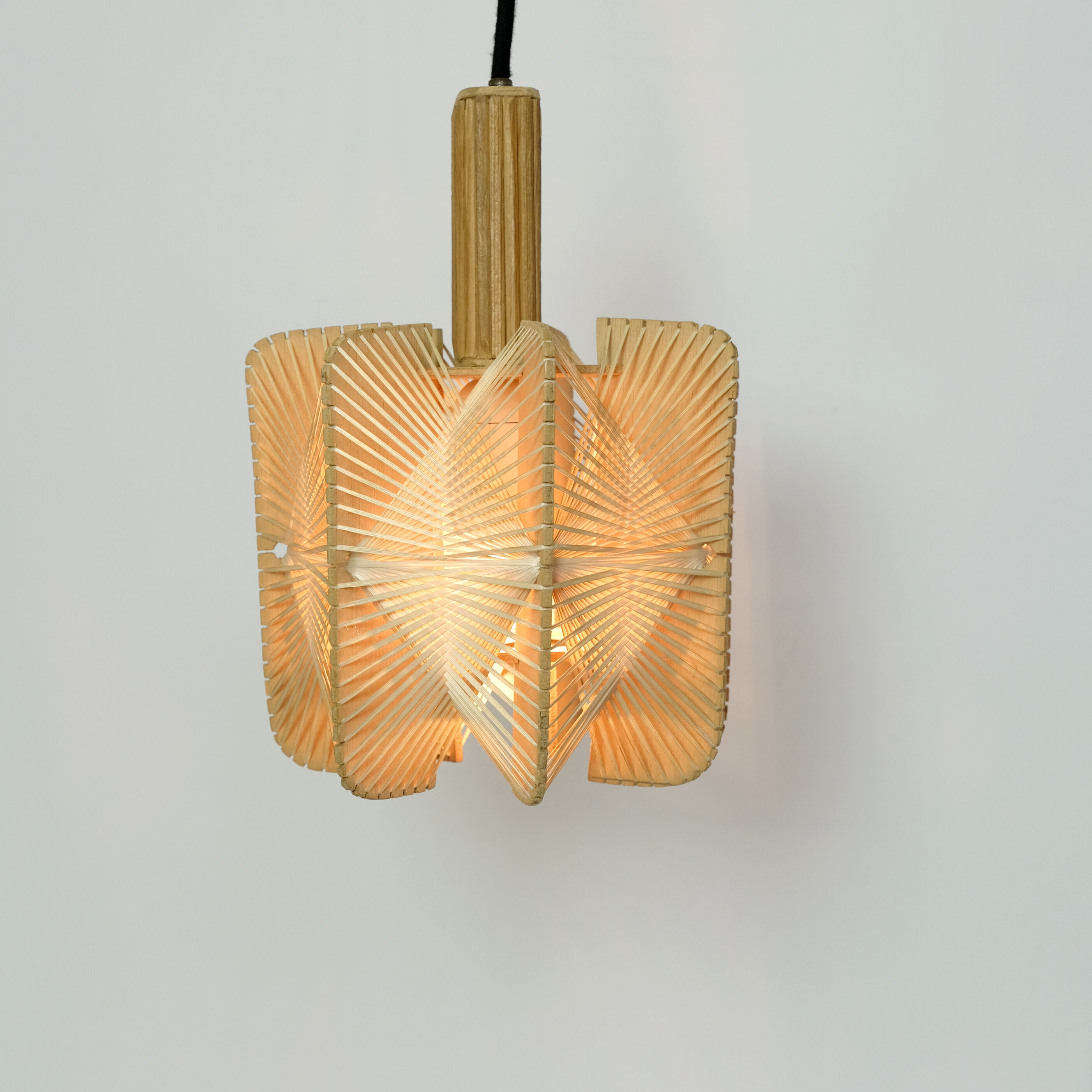 Hanging lamp in wood and threads of the 70