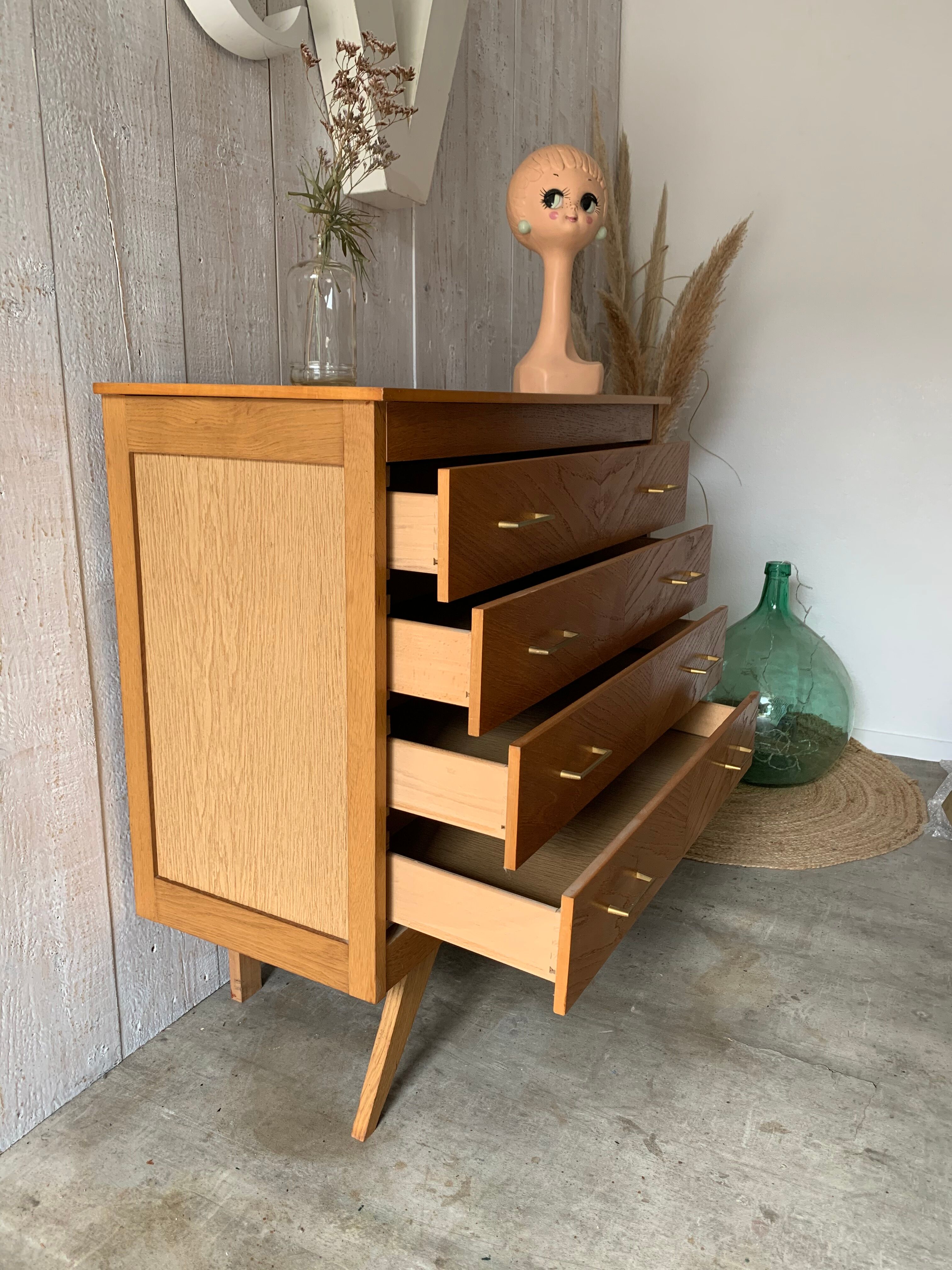 Chest of drawers with compass feet