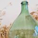 Antique green glass demijohn H30