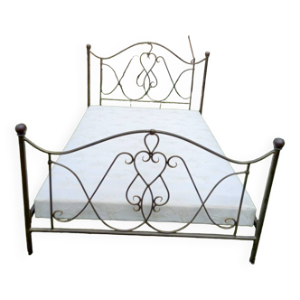 Old wrought iron bed with box spring