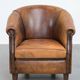 Vintage club chair in sheepskin leather with a characterful look