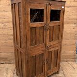 Art Deco glass-fronted cabinet in Burmese teak with original patina.