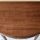 Extendable half-moon table in Louis XVI style