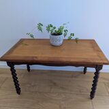 Solid wood coffee table with carved twisted legs