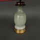 Napoleon III lamp in green cecidon on a brass base