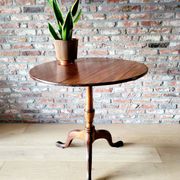 English table with a tilting top, 19th century.