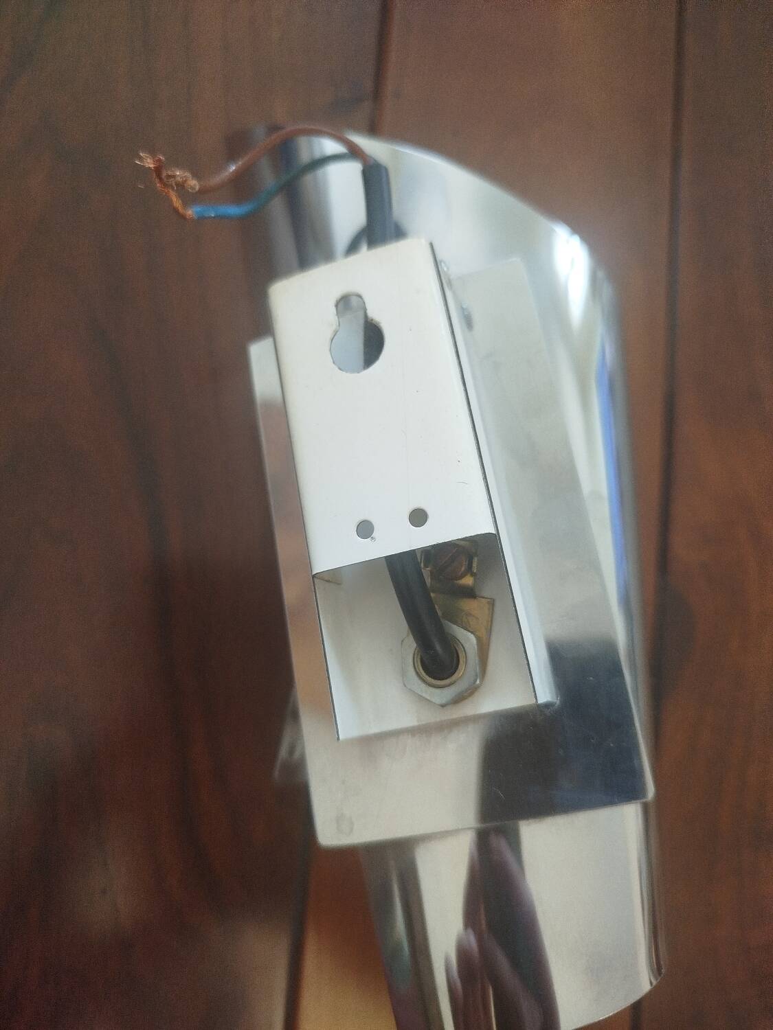 Vintage futuristic wall lamp in chrome sheet metal, space age 70s 80s.