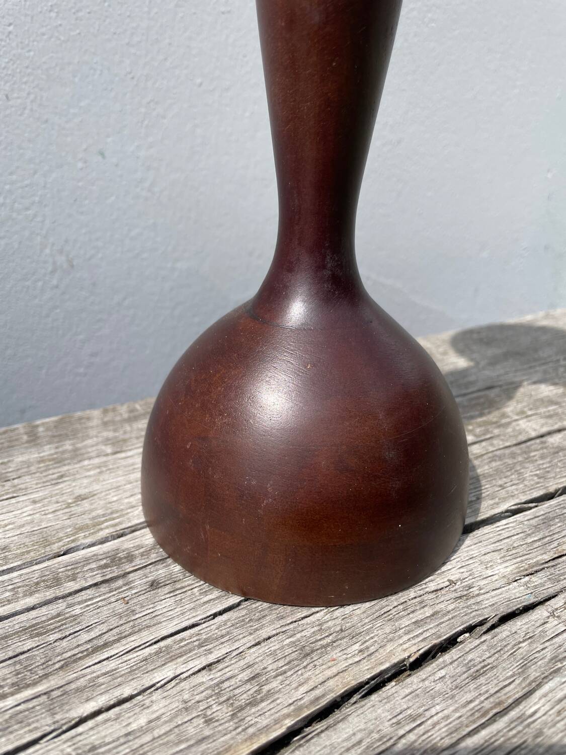 Trio of large turned wooden candlesticks
