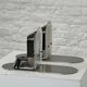 Pair of vintage stainless steel and glass wall lights