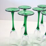 8 large green stem champagne flutes in very good condition.