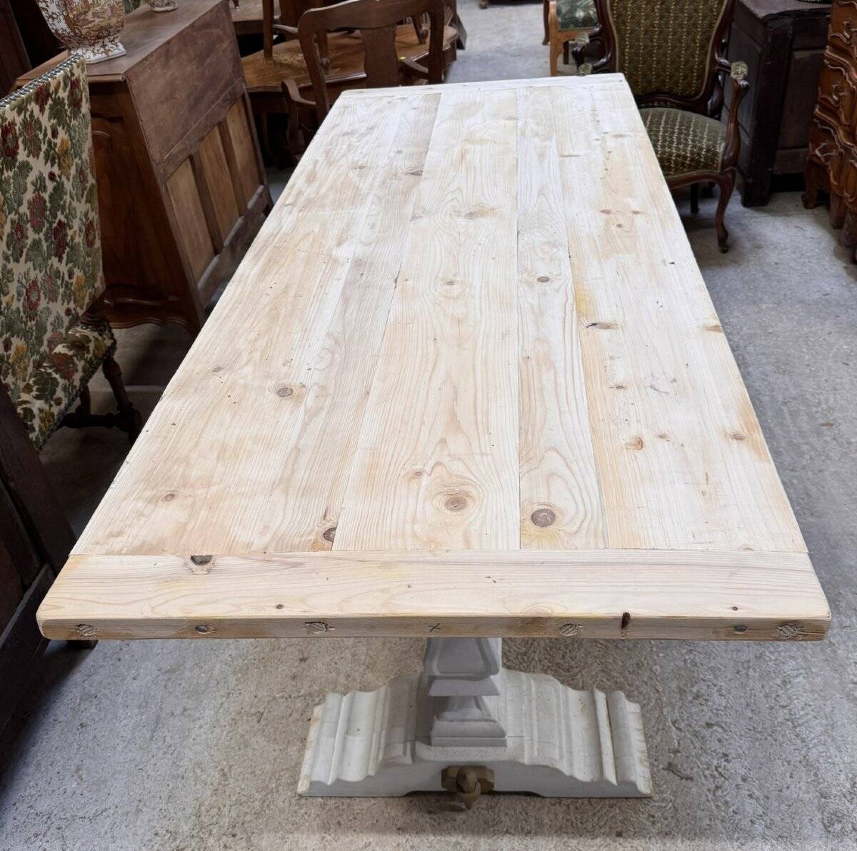 Industrial table with sandblasted top and bleached legs.