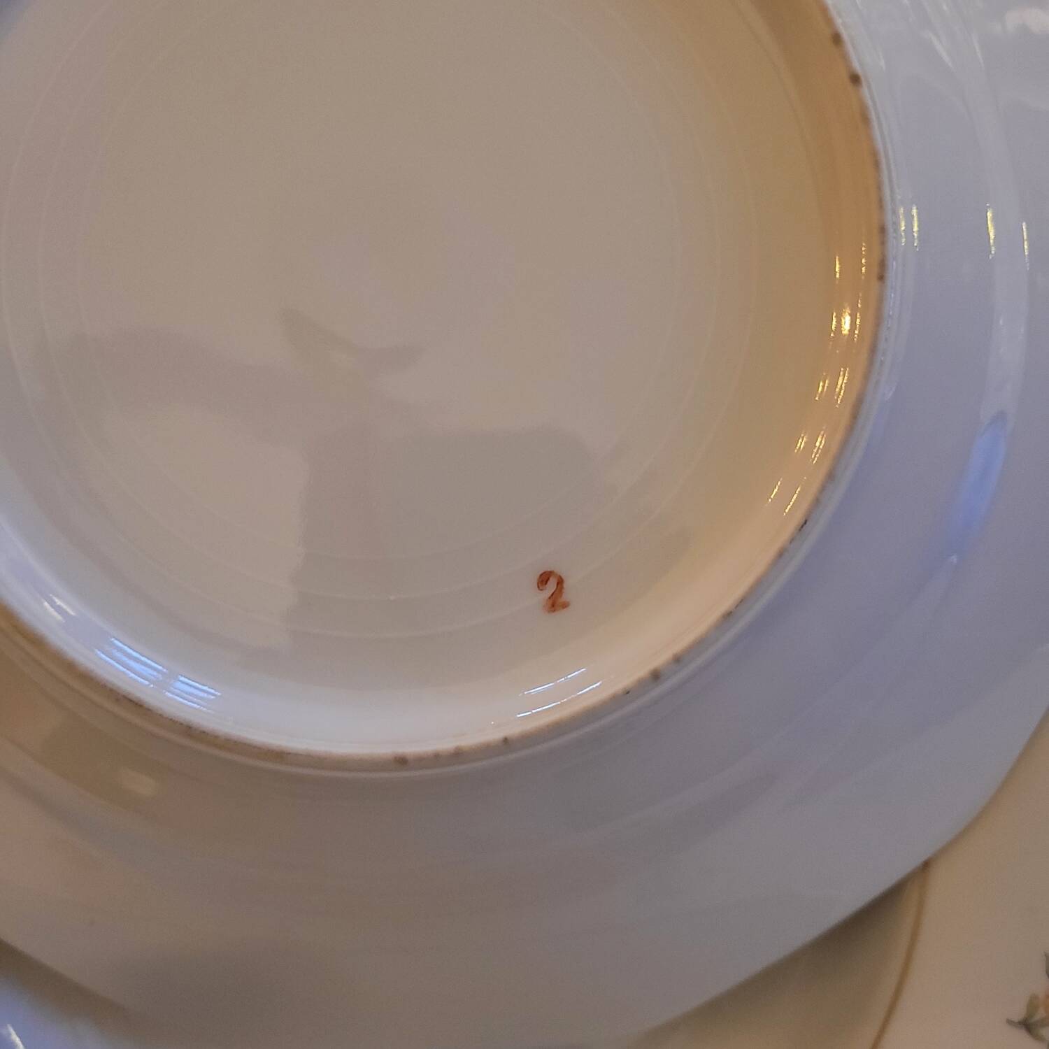 Porcelain soup plates - Decorated with small flowers and a gold rim