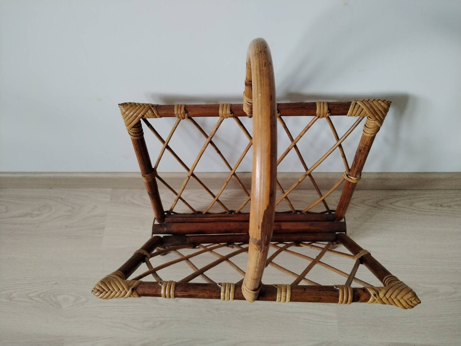 Rattan magazine rack from the 1950s