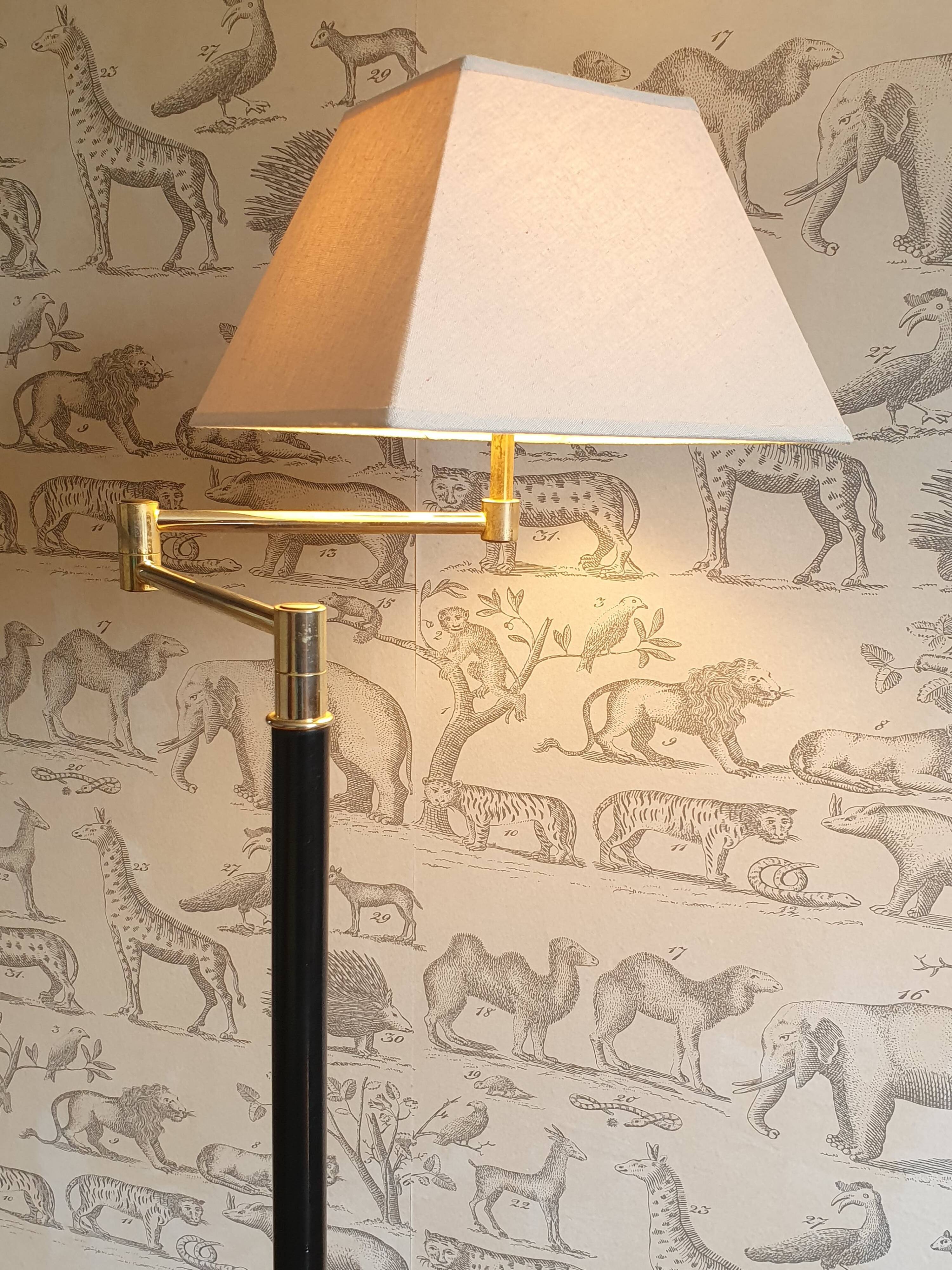 Articulated floor lamp brass e-reader