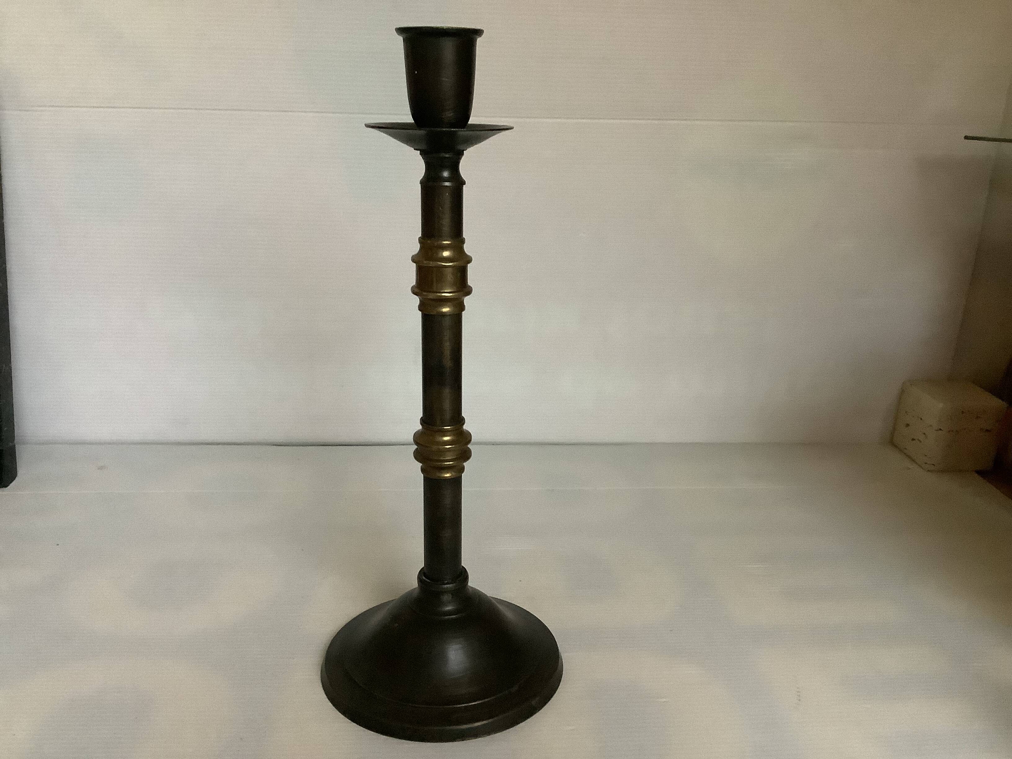 Large candlestick made of sheet metal and brass