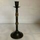 Large candlestick made of sheet metal and brass