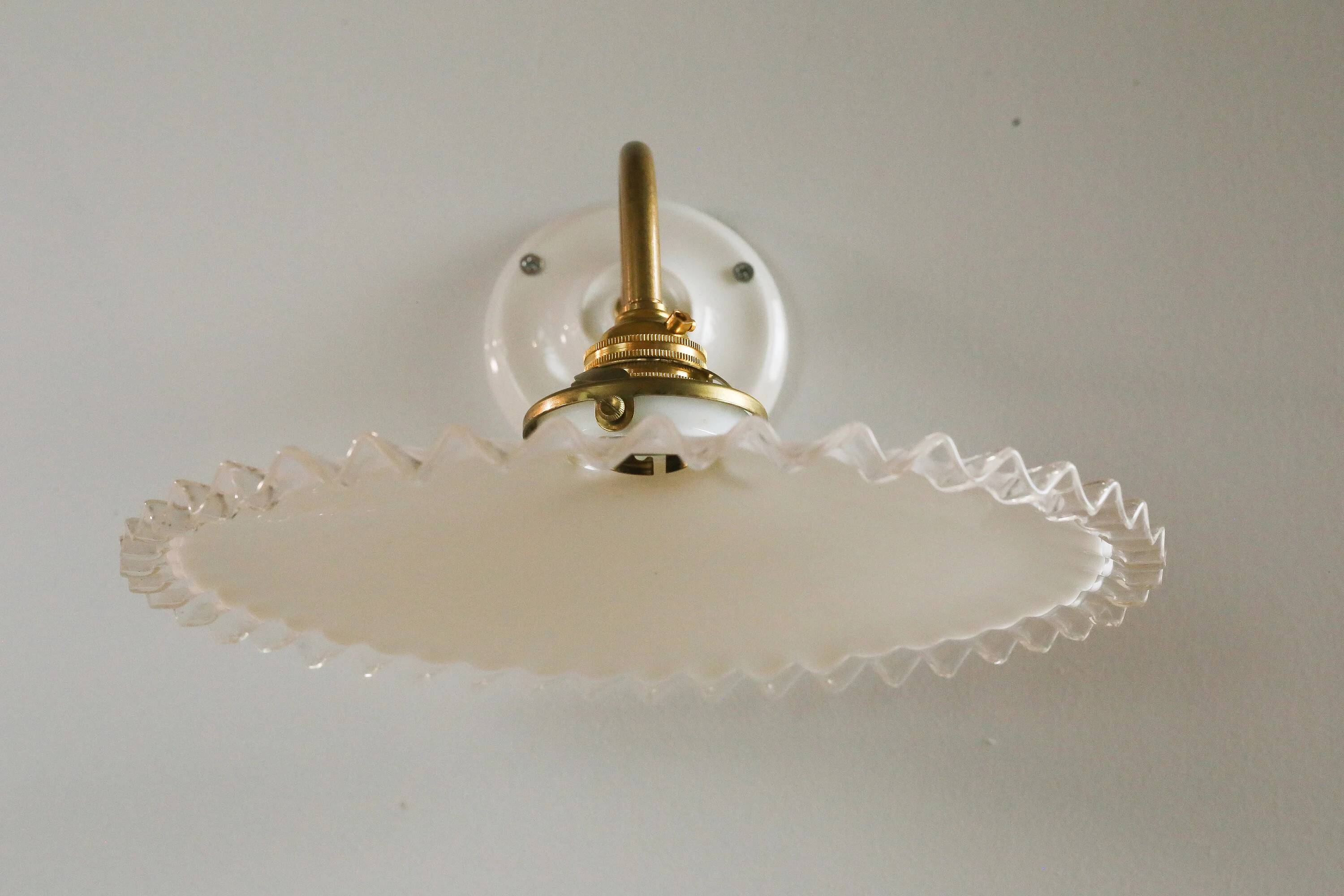 Wall light in white opaline glass, with ceramic and brass support