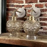 Pair of gold wall sconces