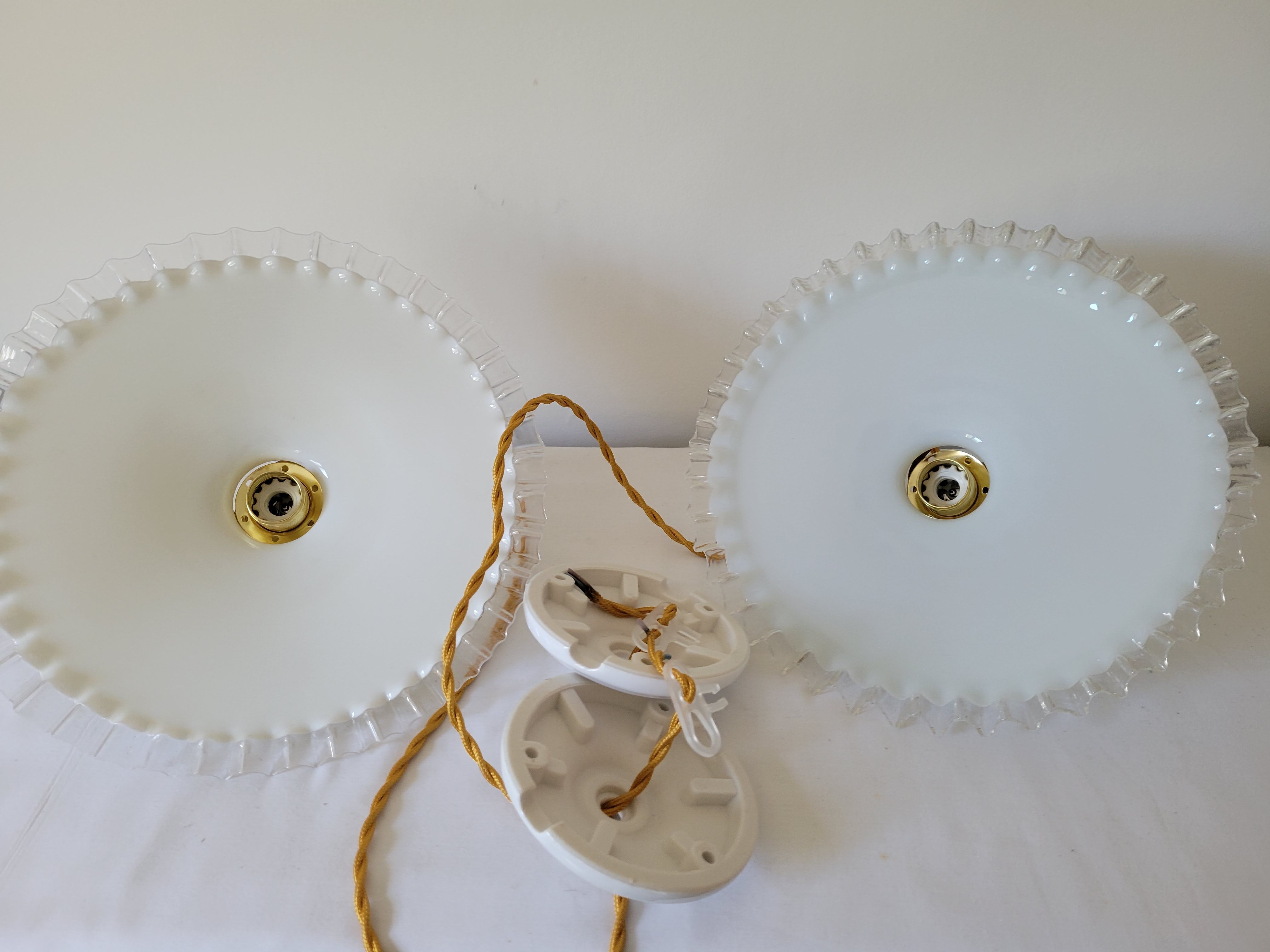 Duo of serrated opaline suspensions