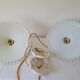 Duo of serrated opaline suspensions
